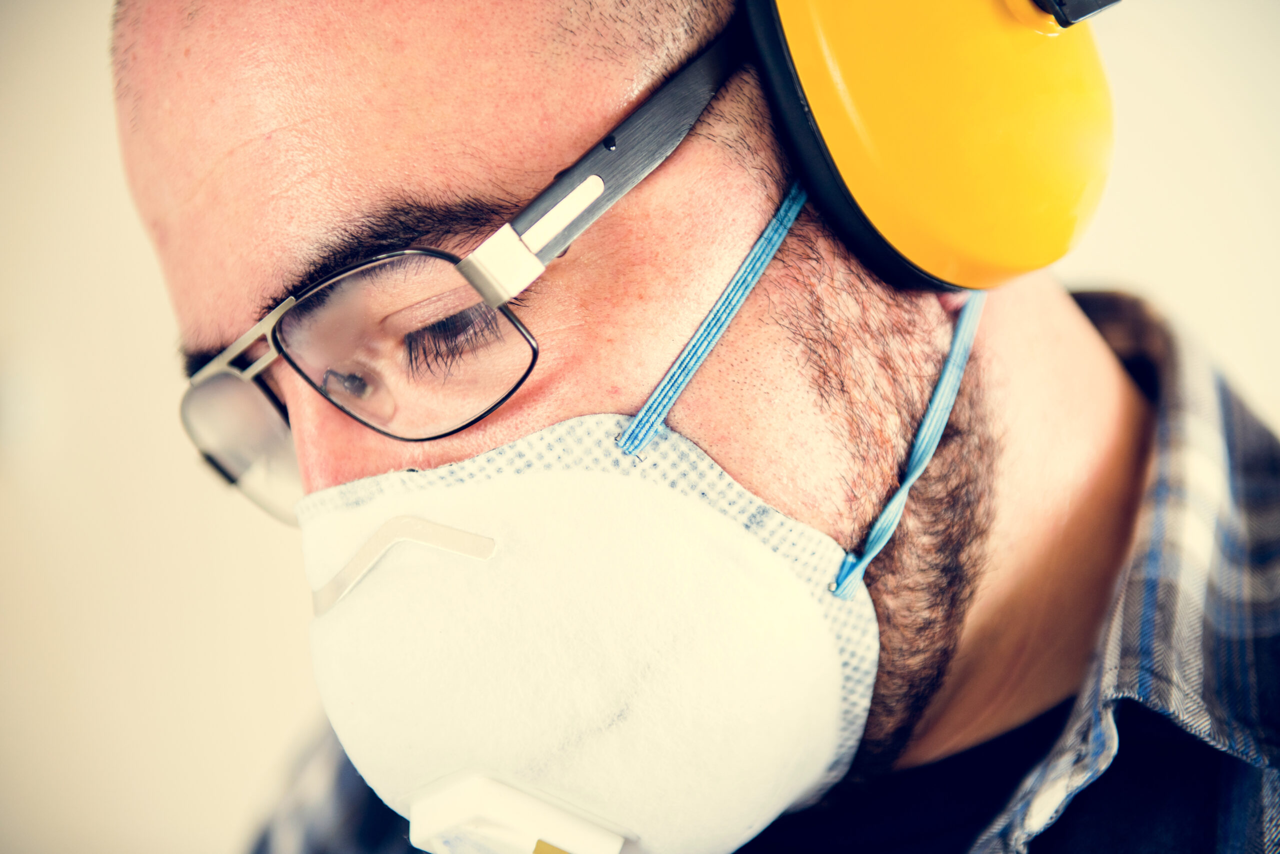 Man wearing ear protection